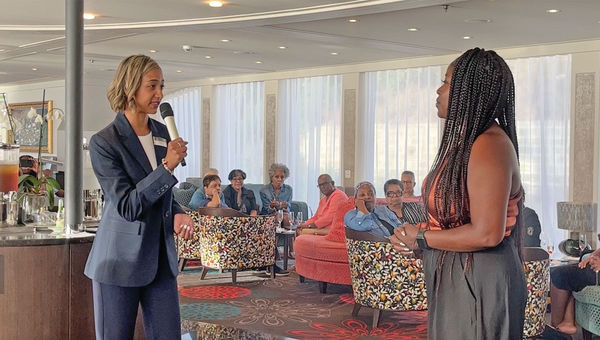 Crystal August (left), AmaWaterways cruise manager, introduces Jazzmine Douse, AmaWaterways director of national accounts, during the Soulful Epicurean Experience cruise.