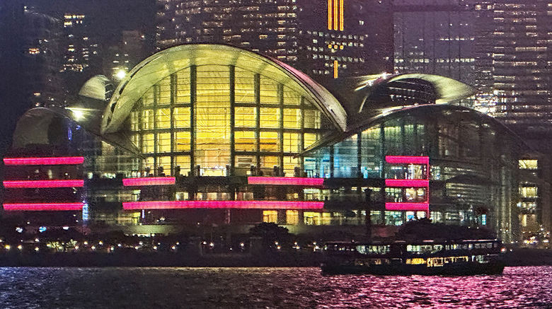 Hong Kong, a special administrative region of China, was one of the last destinations to reopen to tourism when it did so in March. For those who do come, they will find a city that is ready for them. Pictured, the Hong Kong Convention Center at night.
