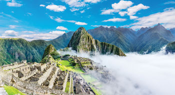 Agricultural terraces and ancient houses in Machu Picchu. The daily visitor cap for Machu Picchu is expected to rise from 4,044 to 4,500 this year.