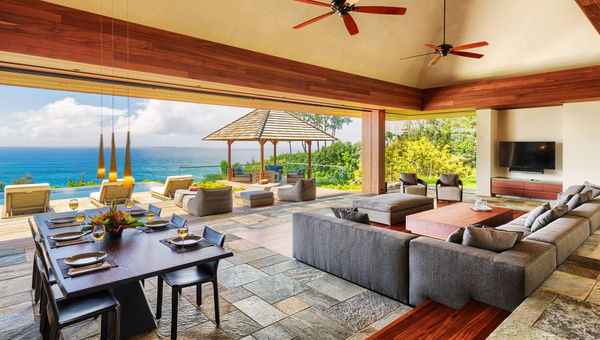 The property known as Secret Cove features four bedrooms and large indoor, outdoor and dining areas.
