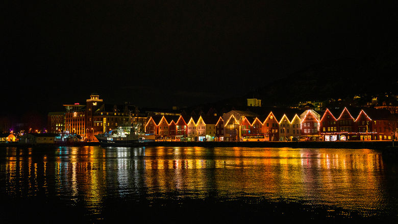 Bergen by night sparkles with holiday decorations.
