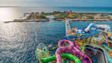 Waterslides and more waterslides: The Icon of the Seas with Perfect Day at CocoCay in the background.